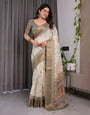 Elegant Cream & Gold Woven Ikat Silk Saree with Designer Border With Tassles