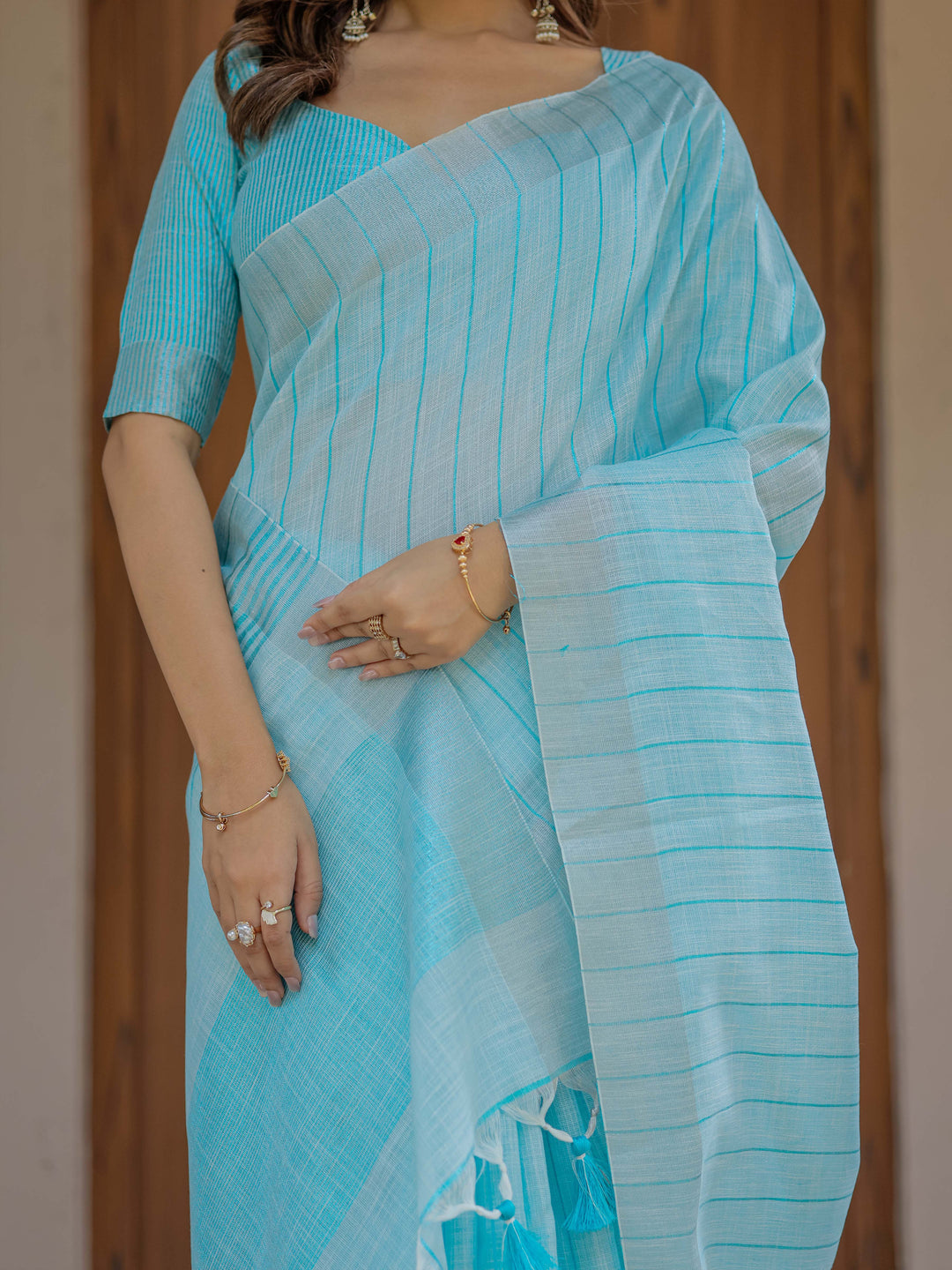 Aqua Blue Pure Handloom Cotton Saree with Striped Weaving & Tassel Detailing