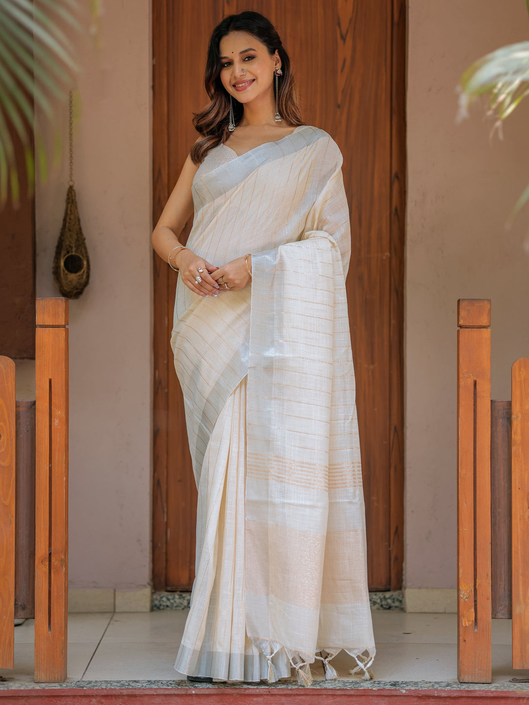 Ivory Cream Pure Handloom Cotton Saree with Golden Striped Weaving & Tassel Detailing