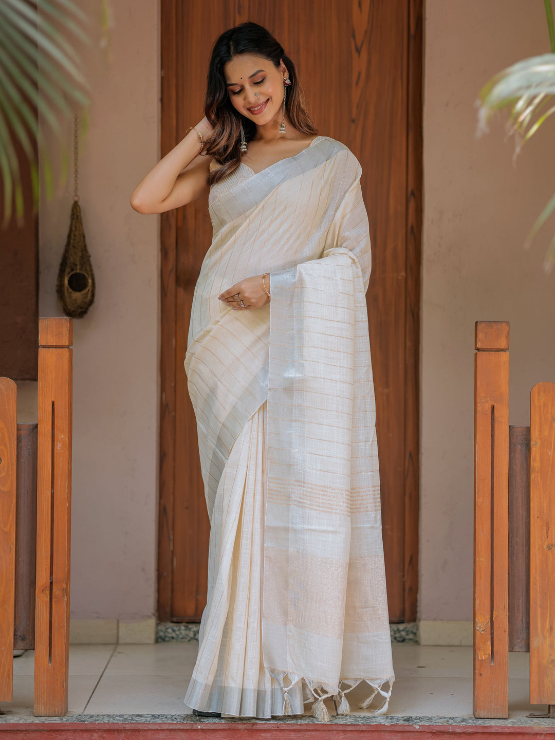 Ivory Cream Pure Handloom Cotton Saree with Golden Striped Weaving & Tassel Detailing