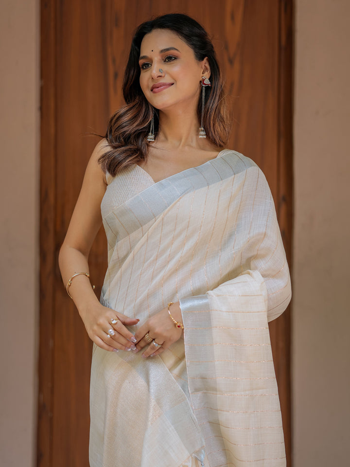 Ivory Cream Pure Handloom Cotton Saree with Golden Striped Weaving & Tassel Detailing