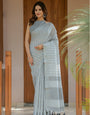 Elegant Ash Grey Handloom Cotton Saree with Minimal Striped Weaving & Tassel Detailing
