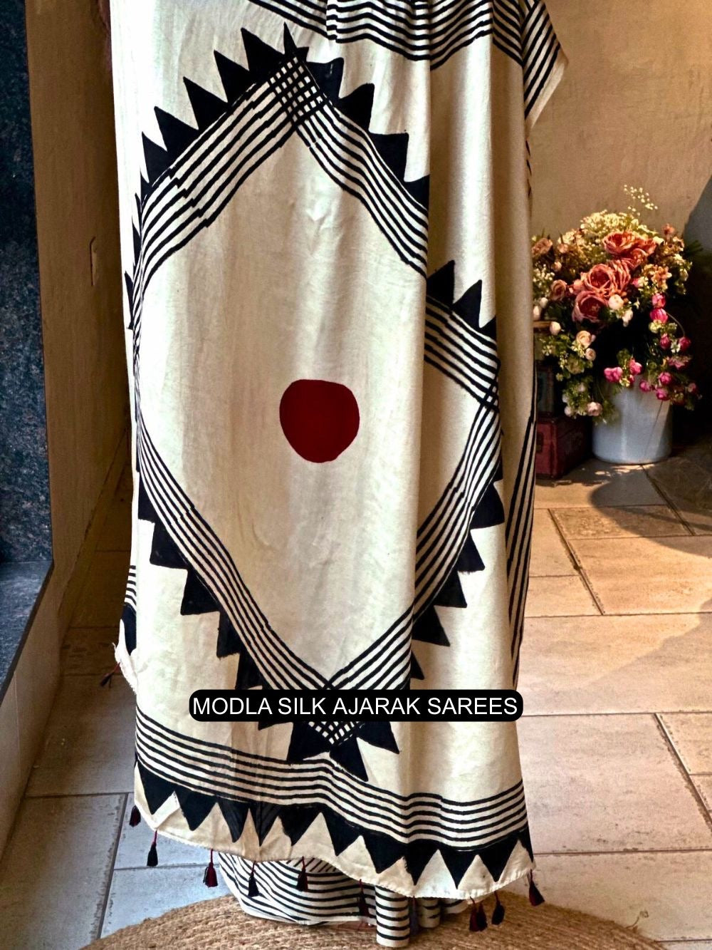 Ivory White &amp; Black Modal Silk Contemporary Ajrakh Saree with Geometric Stripe Pattern, Artistic Statement Pallu &amp; Tassel Detailing