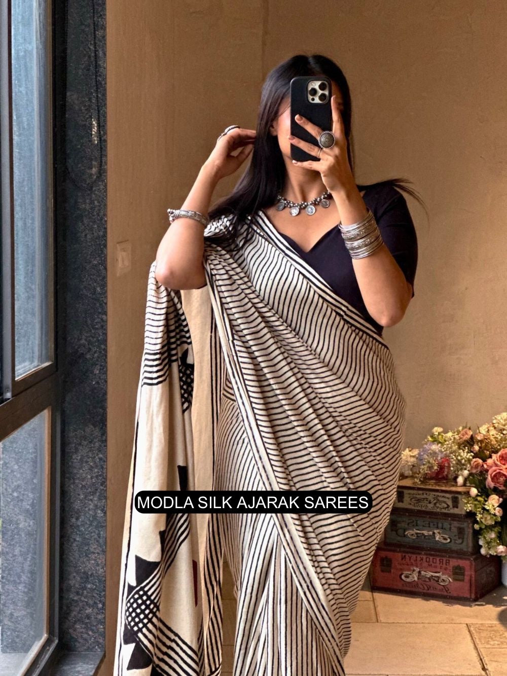 Ivory White &amp; Black Modal Silk Contemporary Ajrakh Saree with Geometric Stripe Pattern, Artistic Statement Pallu &amp; Tassel Detailing