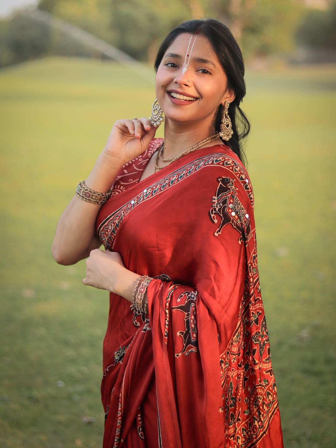 Red Modal Silk Ajrakh Printed Saree with Traditional Cow Motifs &amp; Designer Pallu