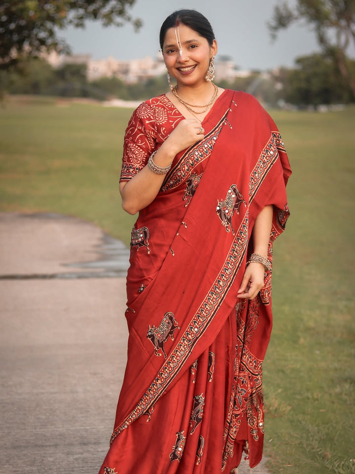 Red Modal Silk Ajrakh Printed Saree with Traditional Cow Motifs &amp; Designer Pallu