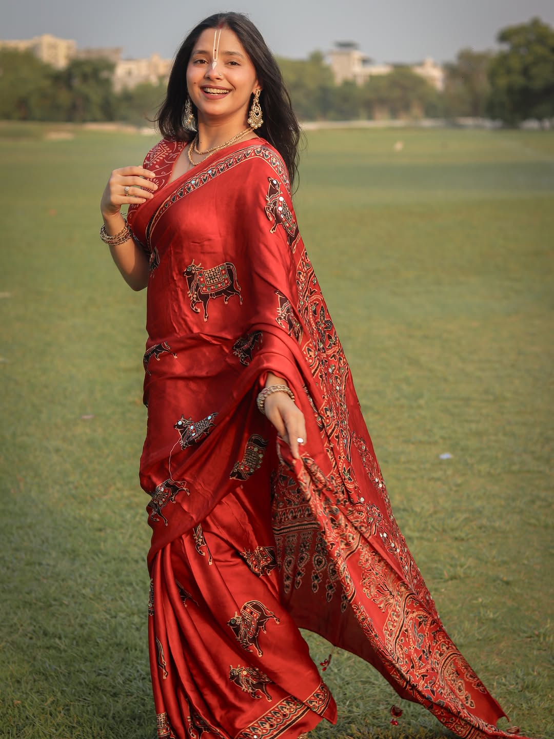 Red Modal Silk Ajrakh Printed Saree with Traditional Cow Motifs &amp; Designer Pallu