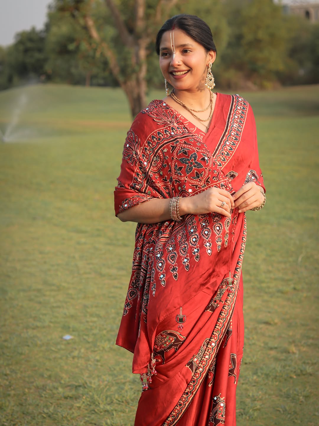 Red Modal Silk Ajrakh Printed Saree with Traditional Cow Motifs &amp; Designer Pallu