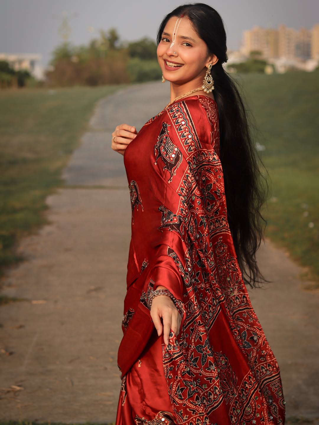Red Modal Silk Ajrakh Printed Saree with Traditional Cow Motifs &amp; Designer Pallu