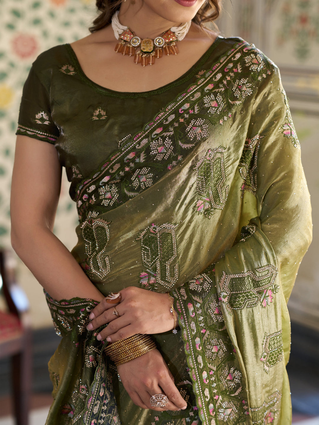 Olive Green Fendy Satin Embroidered Saree with Geometric & Floral Motifs | Designer Zari Border Saree with Tassels & Heavy Embroidered Blouse