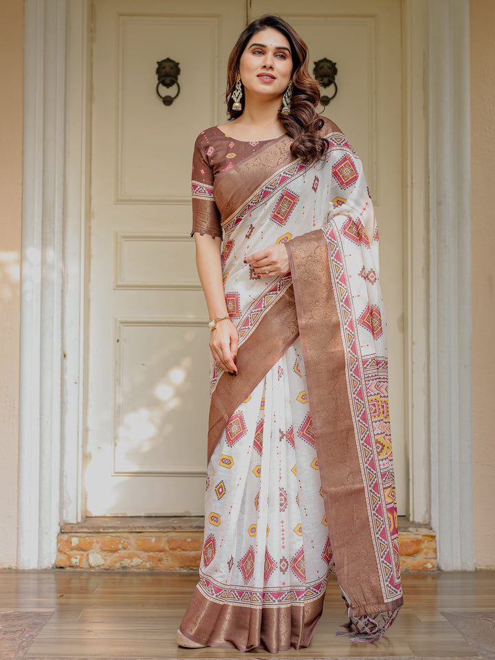 Ivory & Copper Brown Tribal Printed Saree with Rich Zari Border & Tassels – Ethnic Festive Wear
