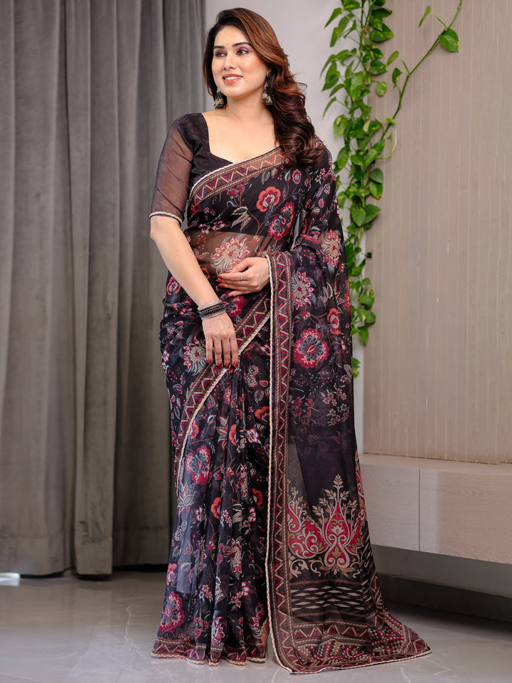 Black Floral Printed Organza Saree with Ethnic Border & Ornamental Pallu | Designer Sheer Organza Saree with Traditional Motifs & Blouse Piece | Elegant Festive & Party Wear Saree