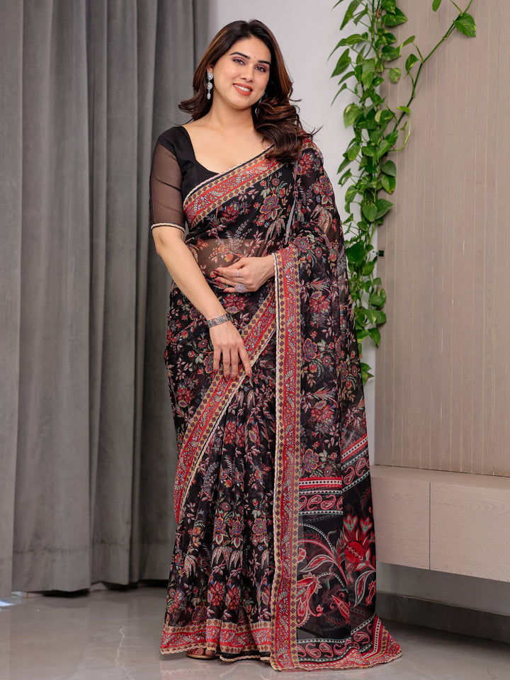 Black Designer Floral Printed Organza Saree with Traditional Paisley Border | Lightweight Sheer Organza Saree with Ethnic Motifs & Attached Blouse Piece | Festive & Party Wear Saree