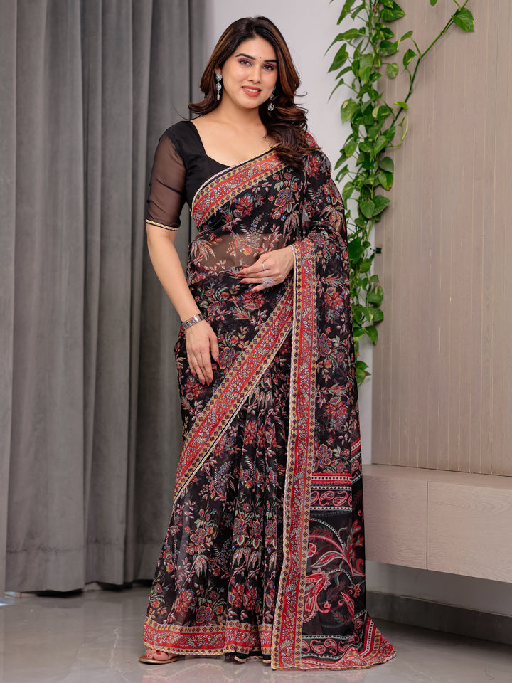 Black Designer Floral Printed Organza Saree with Traditional Paisley Border | Lightweight Sheer Organza Saree with Ethnic Motifs & Attached Blouse Piece | Festive & Party Wear Saree