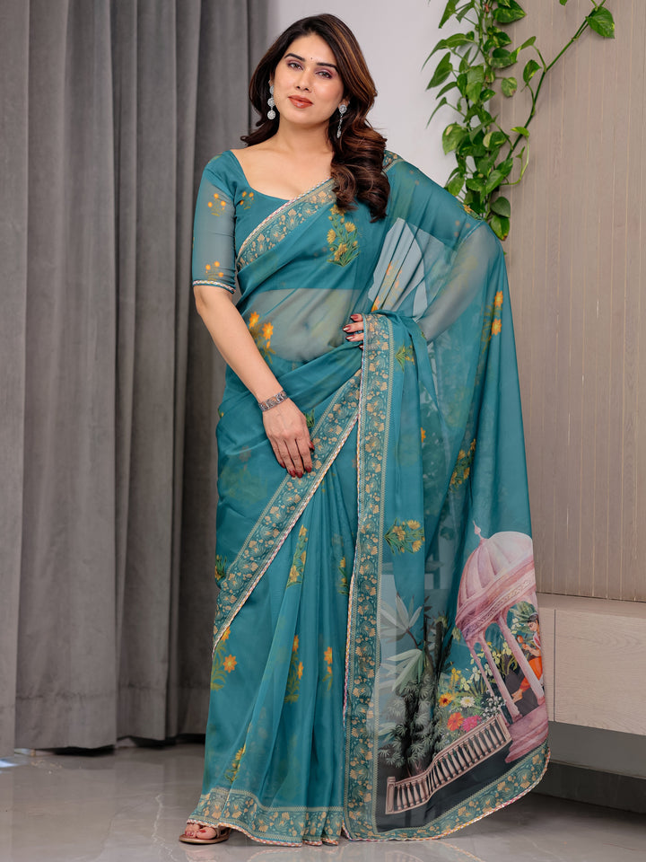 Teal Green Scenic Printed Organza Saree with Garden Pavilion Artwork Pallu | Designer Lightweight Organza Saree with Floral Motifs & Decorative Border | Festive & Party Wear Saree with Blouse Piece