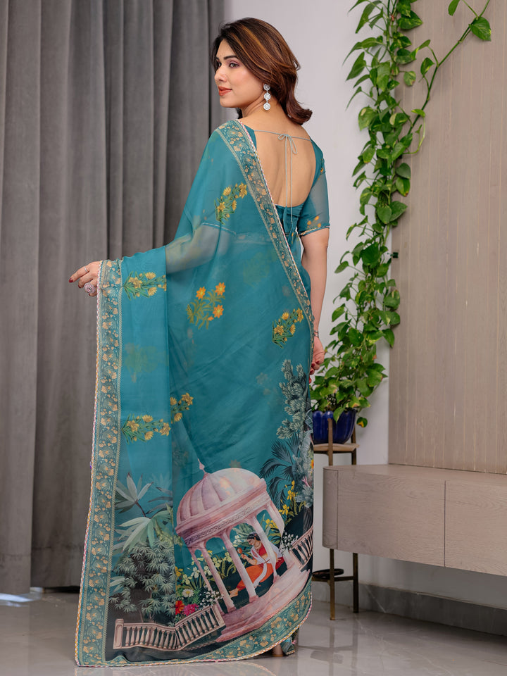 Teal Green Scenic Printed Organza Saree with Garden Pavilion Artwork Pallu | Designer Lightweight Organza Saree with Floral Motifs & Decorative Border | Festive & Party Wear Saree with Blouse Piece
