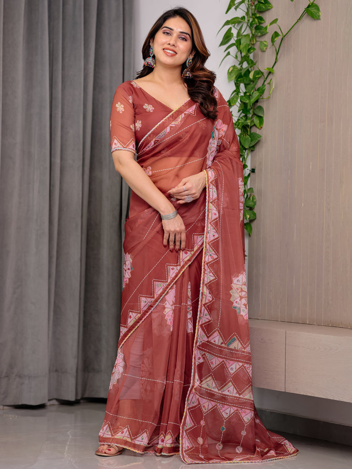 Rust Terracotta Printed Organza Saree with Mandala Motifs & Geometric Border | Designer Lightweight Organza Saree with Multicolour Lace Edge | Festive & Party Wear Saree