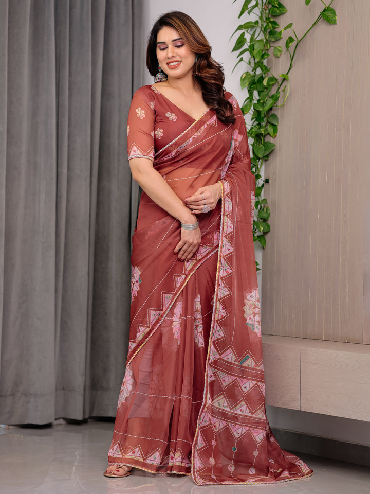 Rust Terracotta Printed Organza Saree with Mandala Motifs & Geometric Border | Designer Lightweight Organza Saree with Multicolour Lace Edge | Festive & Party Wear Saree
