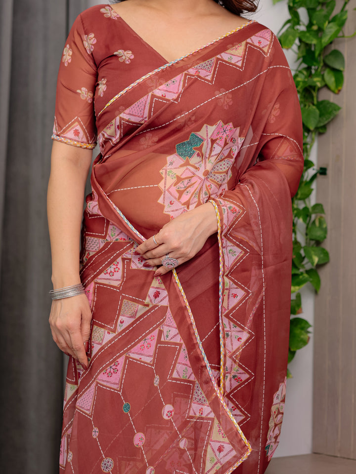 Rust Terracotta Printed Organza Saree with Mandala Motifs & Geometric Border | Designer Lightweight Organza Saree with Multicolour Lace Edge | Festive & Party Wear Saree