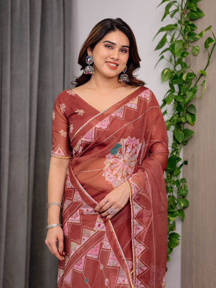 Rust Terracotta Printed Organza Saree with Mandala Motifs & Geometric Border | Designer Lightweight Organza Saree with Multicolour Lace Edge | Festive & Party Wear Saree